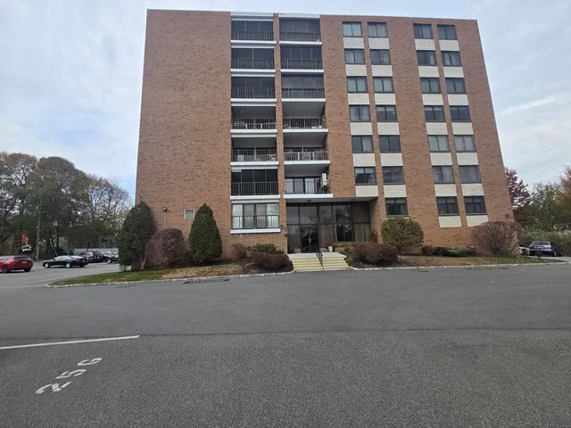 a view of a building with a street