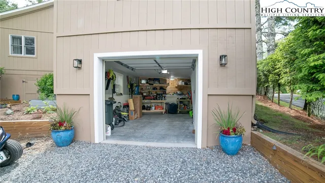 a view of a path along with potted plant