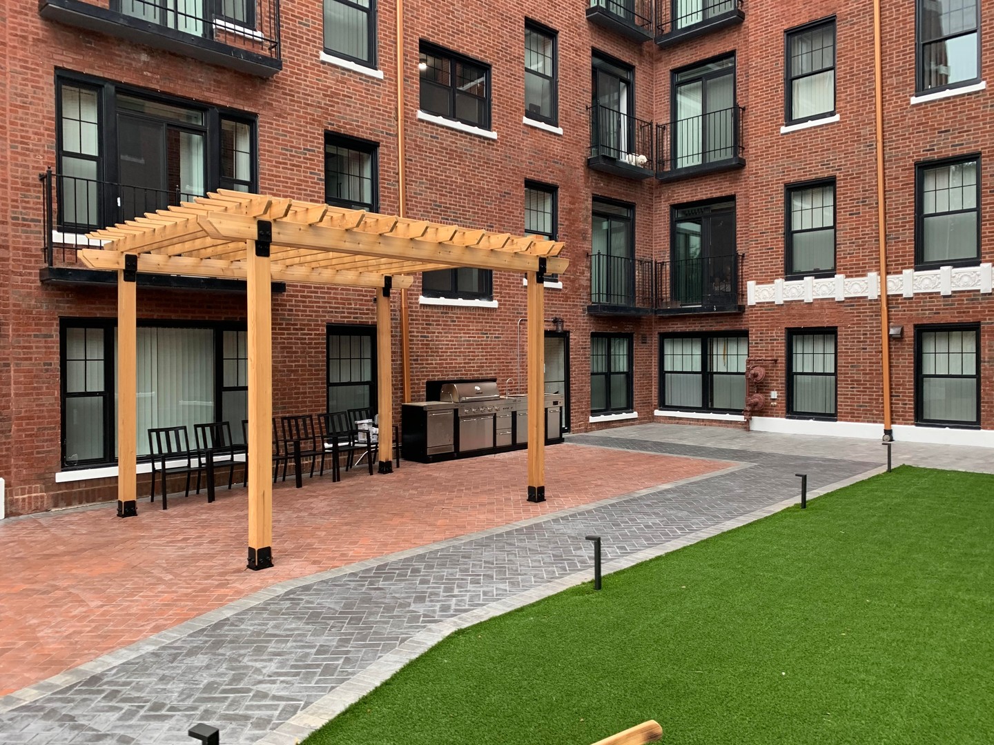 7645 North Sheridan Road, Unit 216 Chicago, IL 60626 - Photo 10 of 14 a view of a building with a yard