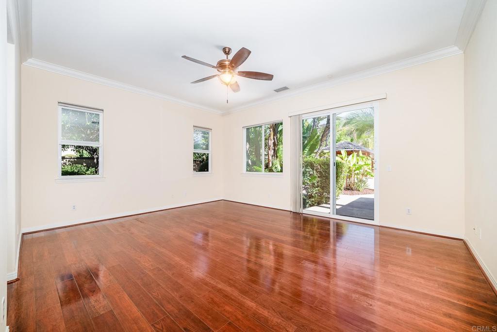 1075 Crimson Drive San Marcos, CA 92069 - Photo 11 of 74 a view of an empty room with wooden floor and a window
