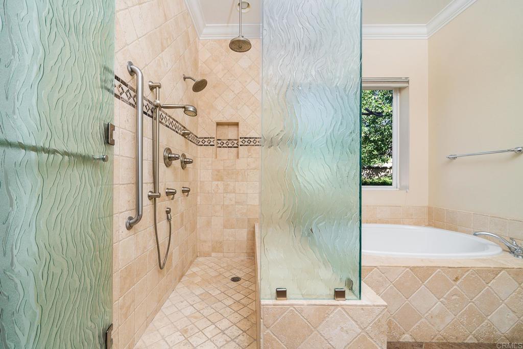 1075 Crimson Drive San Marcos, CA 92069 - Photo 16 of 74 a bathroom with a bathtub and a shower