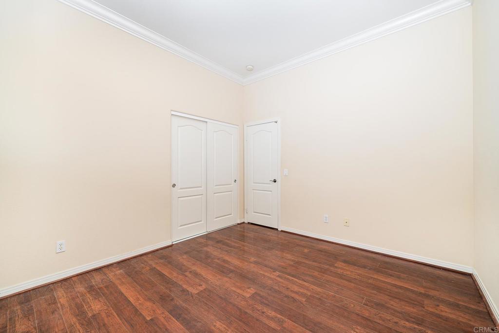 1075 Crimson Drive San Marcos, CA 92069 - Photo 20 of 74 an empty room with wooden floor