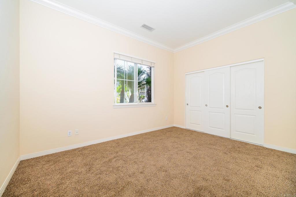 1075 Crimson Drive San Marcos, CA 92069 - Photo 23 of 74 an empty room with windows