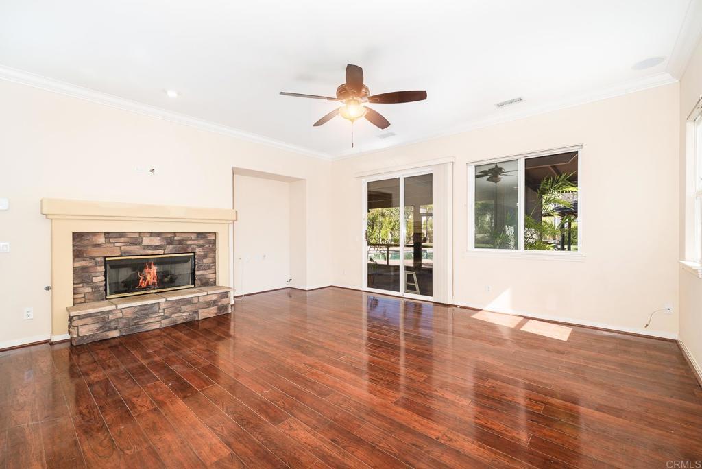 1075 Crimson Drive San Marcos, CA 92069 - Photo 25 of 74 an empty room with windows and fireplace