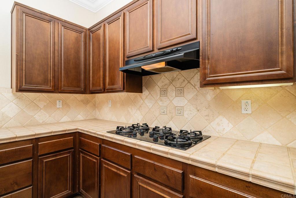 1075 Crimson Drive San Marcos, CA 92069 - Photo 30 of 74 a kitchen with a sink and cabinets