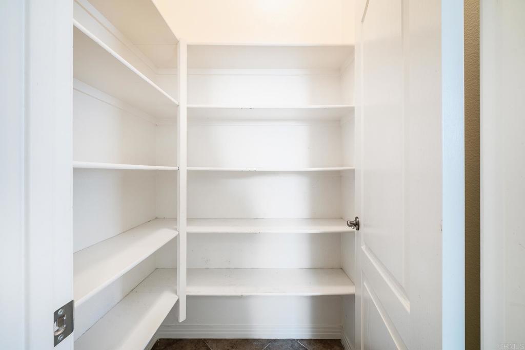 1075 Crimson Drive San Marcos, CA 92069 - Photo 32 of 74 a view of a store room with shelves