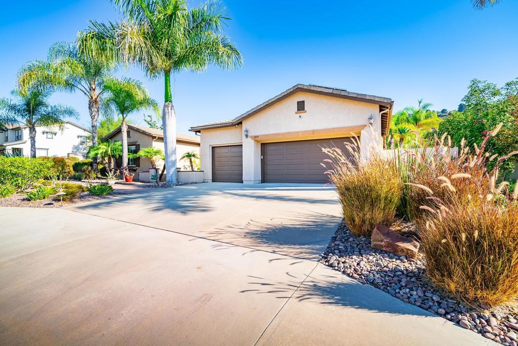 1075 Crimson Drive San Marcos, CA 92069 - Photo 38 of 74 a front view of a house with garden