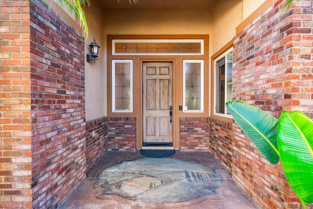 1075 Crimson Drive San Marcos, CA 92069 - Photo 4 of 74 a view of front door of house with outdoor space