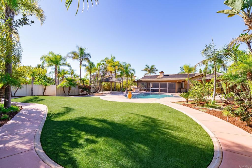 1075 Crimson Drive San Marcos, CA 92069 - Photo 59 of 74 a swimming pool with outdoor seating and plants