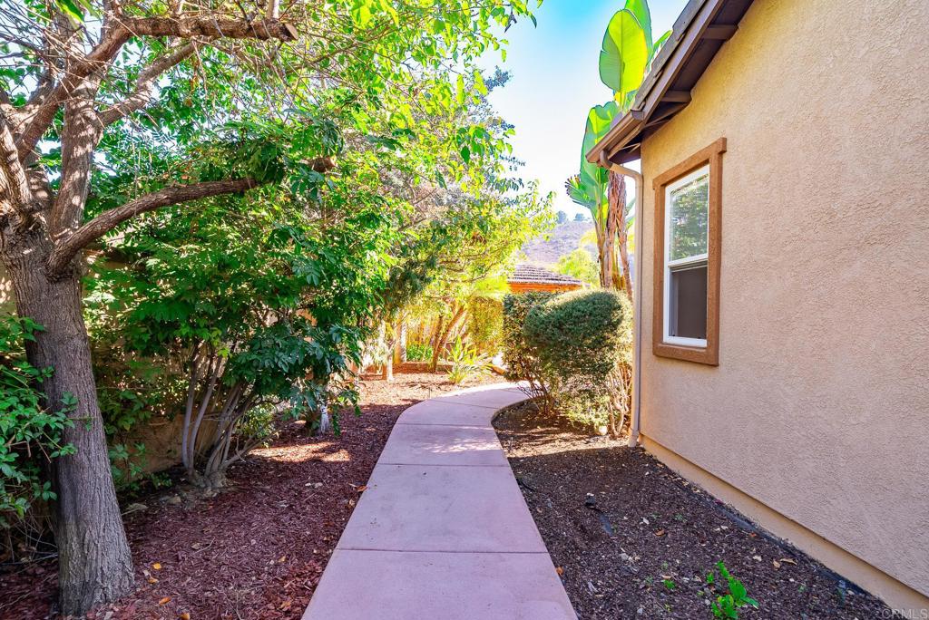 1075 Crimson Drive San Marcos, CA 92069 - Photo 70 of 74 a view of a pathway both side of the house
