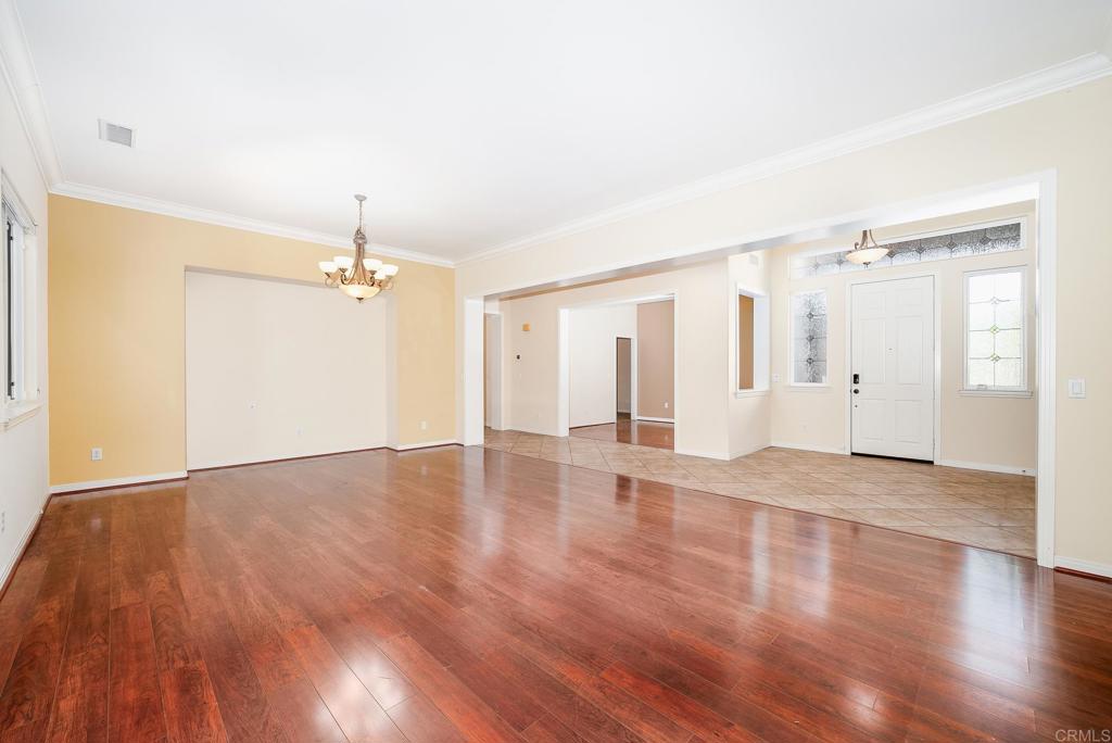 1075 Crimson Drive San Marcos, CA 92069 - Photo 8 of 74 a view of an empty room with wooden floor