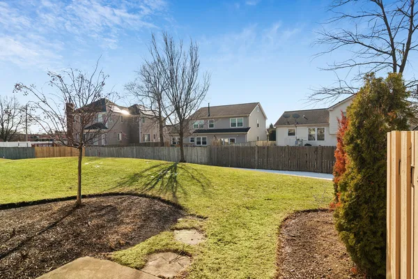 a view of swimming pool with a yard