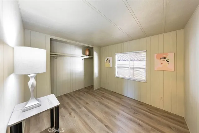 a bathroom with a double vanity sink mirror and toilet