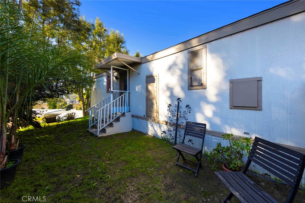 32802 Valle Road, Unit 108 San Juan Capistrano, CA 92675 - Photo 26 of 32 a view of a house with a yard