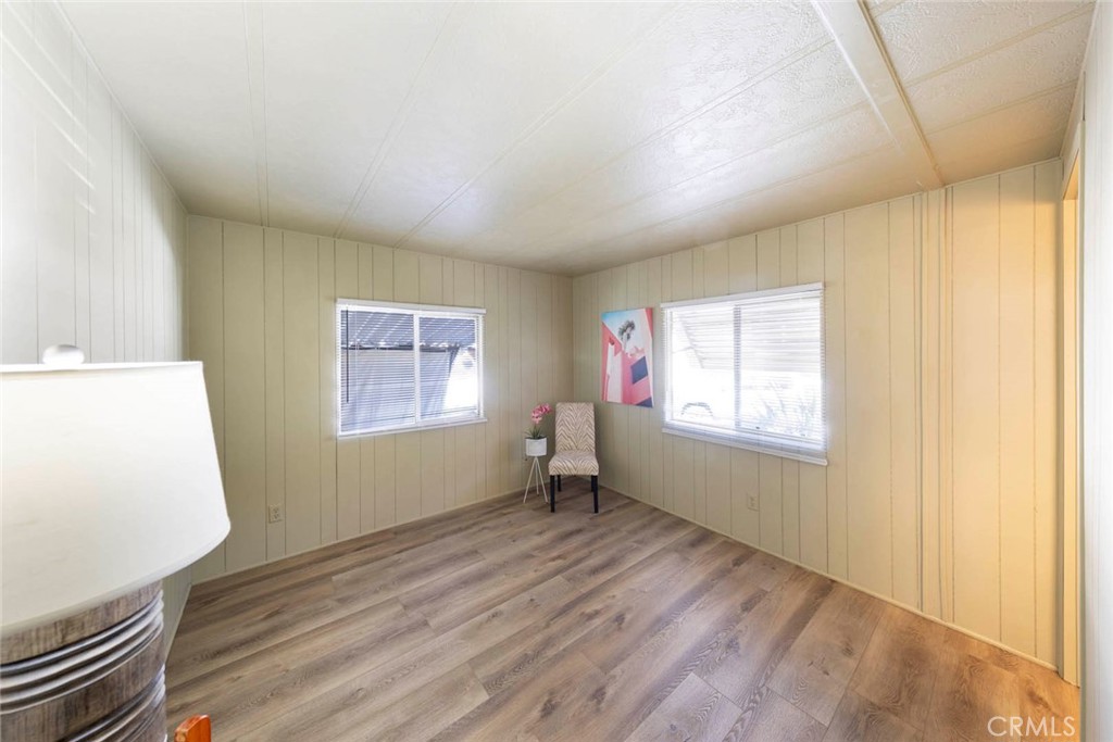 32802 Valle Road, Unit 108 San Juan Capistrano, CA 92675 - Photo 10 of 32 a view of an empty room with a window