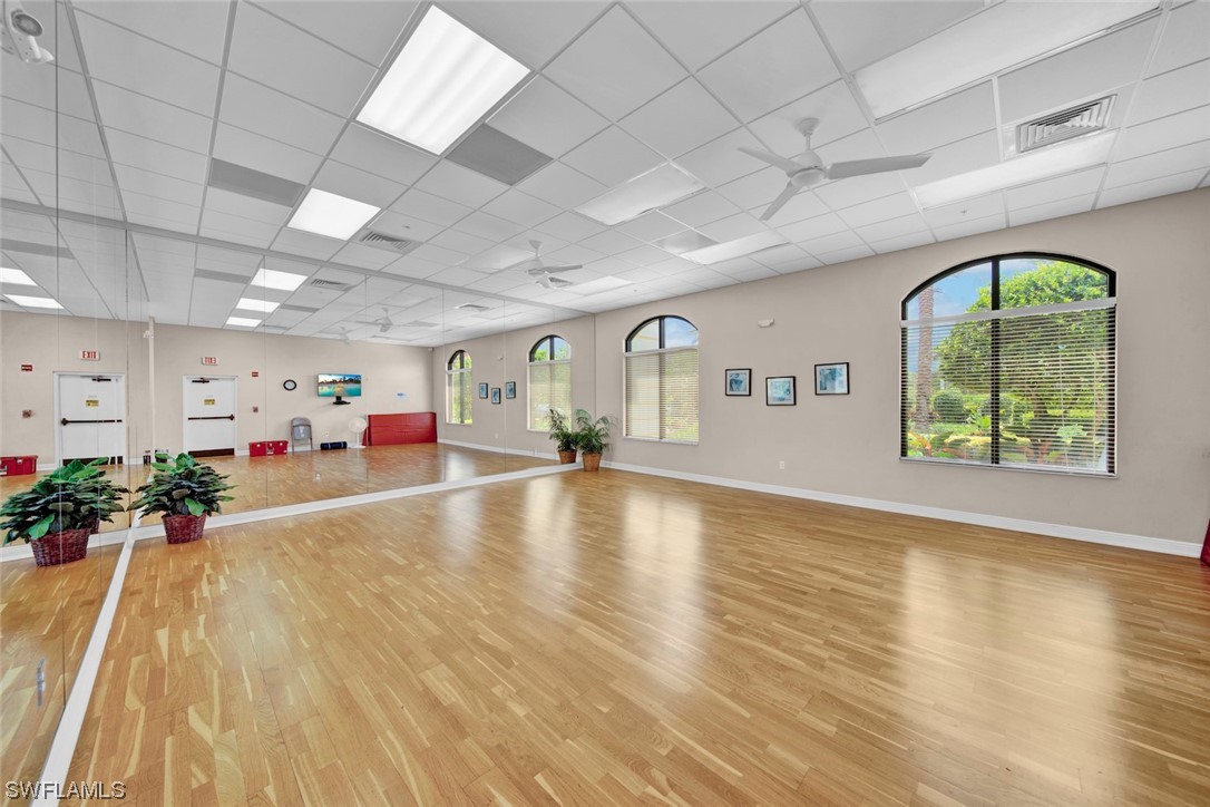 19630 Tesoro Way Estero, FL 33967 - Photo 36 of 44 a view of room with furniture and a large window