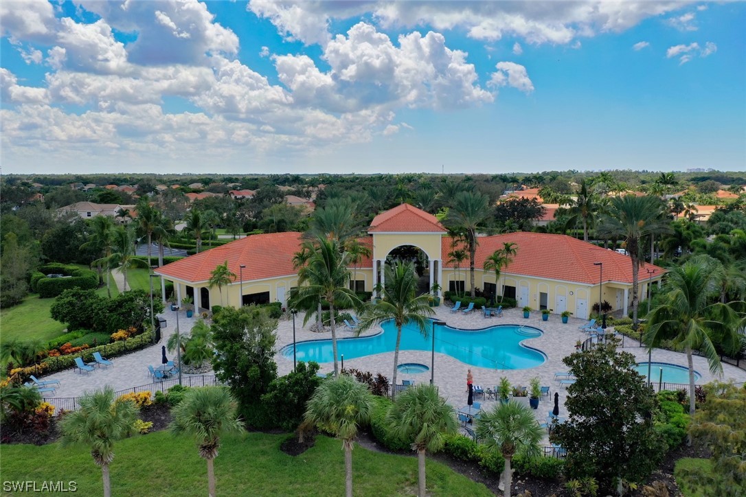 19630 Tesoro Way Estero, FL 33967 - Photo 40 of 44 an aerial view of house with yard and swimming pool