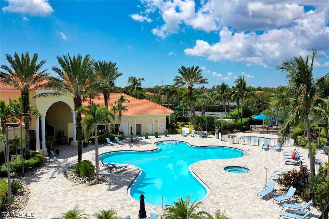 19630 Tesoro Way Estero, FL 33967 - Photo 42 of 44 a view of a house with swimming pool and sitting area