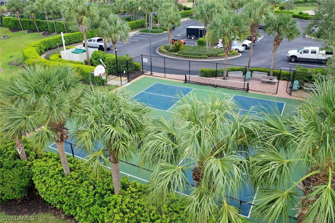 19630 Tesoro Way Estero, FL 33967 - Photo 43 of 44 a view of a backyard with sitting area