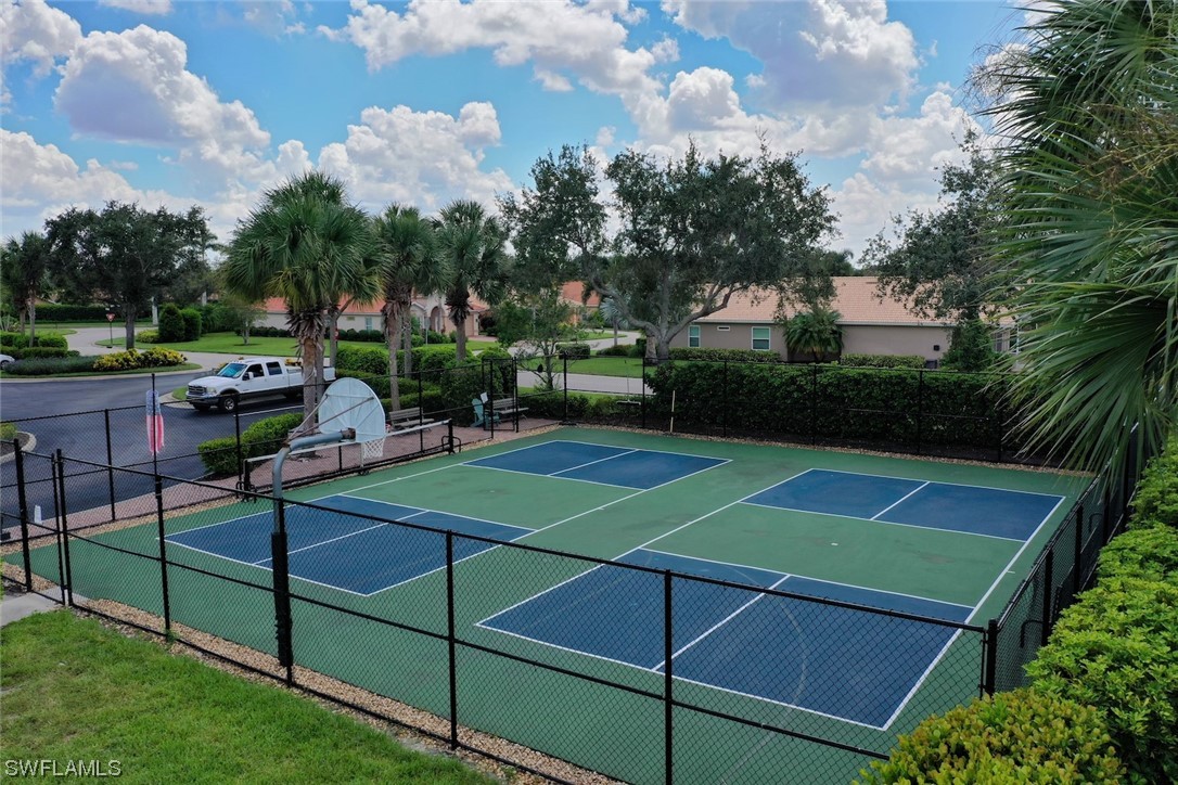 19630 Tesoro Way Estero, FL 33967 - Photo 44 of 44 a backyard of a house with lots of green space