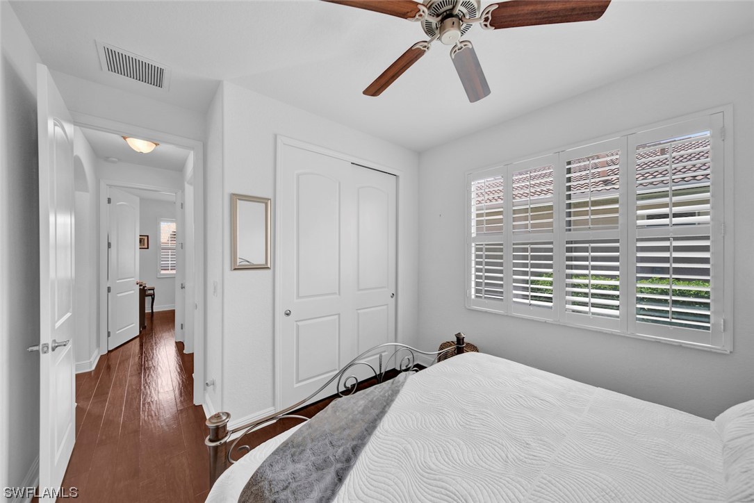 19630 Tesoro Way Estero, FL 33967 - Photo 5 of 44 a bedroom with a bed and a window