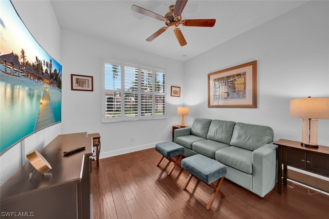 19630 Tesoro Way Estero, FL 33967 - Photo 6 of 44 a living room with furniture and a window