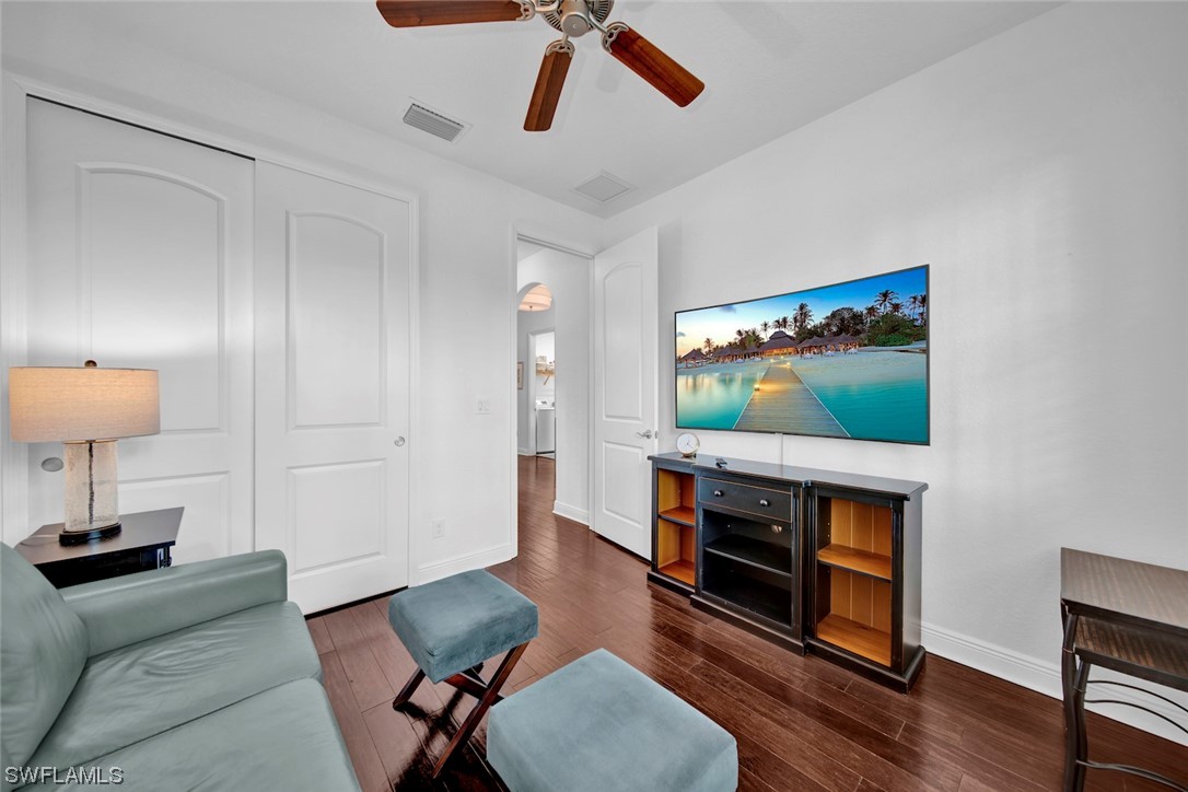 19630 Tesoro Way Estero, FL 33967 - Photo 7 of 44 a living room with furniture and a flat screen tv