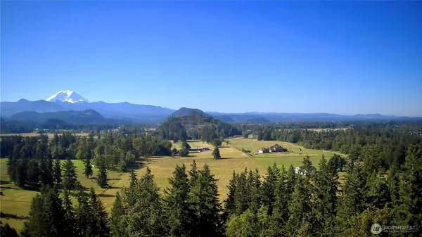 a view of a lake with mountains in the background