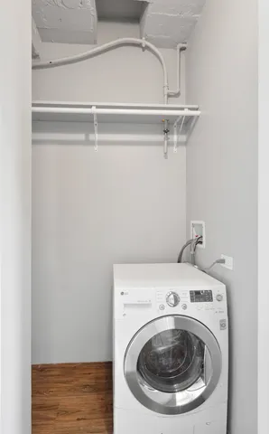 a utility room with dryer and washer