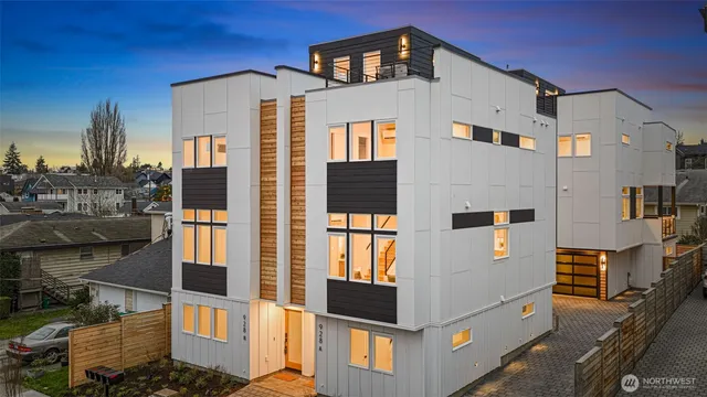 a front view of a building with large windows