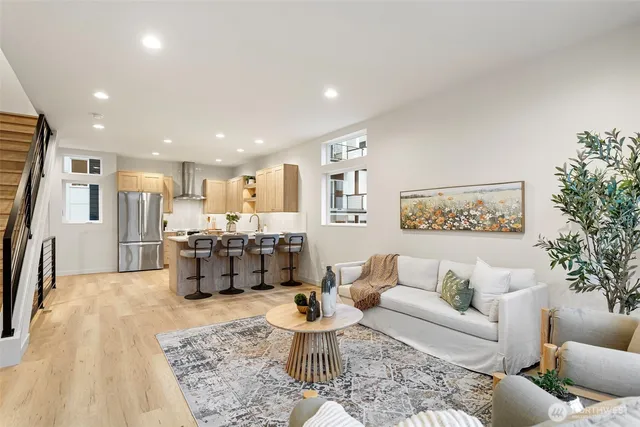 a living room with furniture and a table