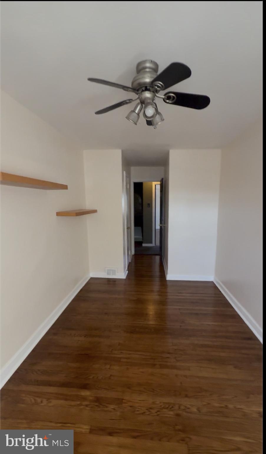 809 Millwood Road Philadelphia, PA 19115 - Photo 17 of 20 a view of an empty room with wooden floor