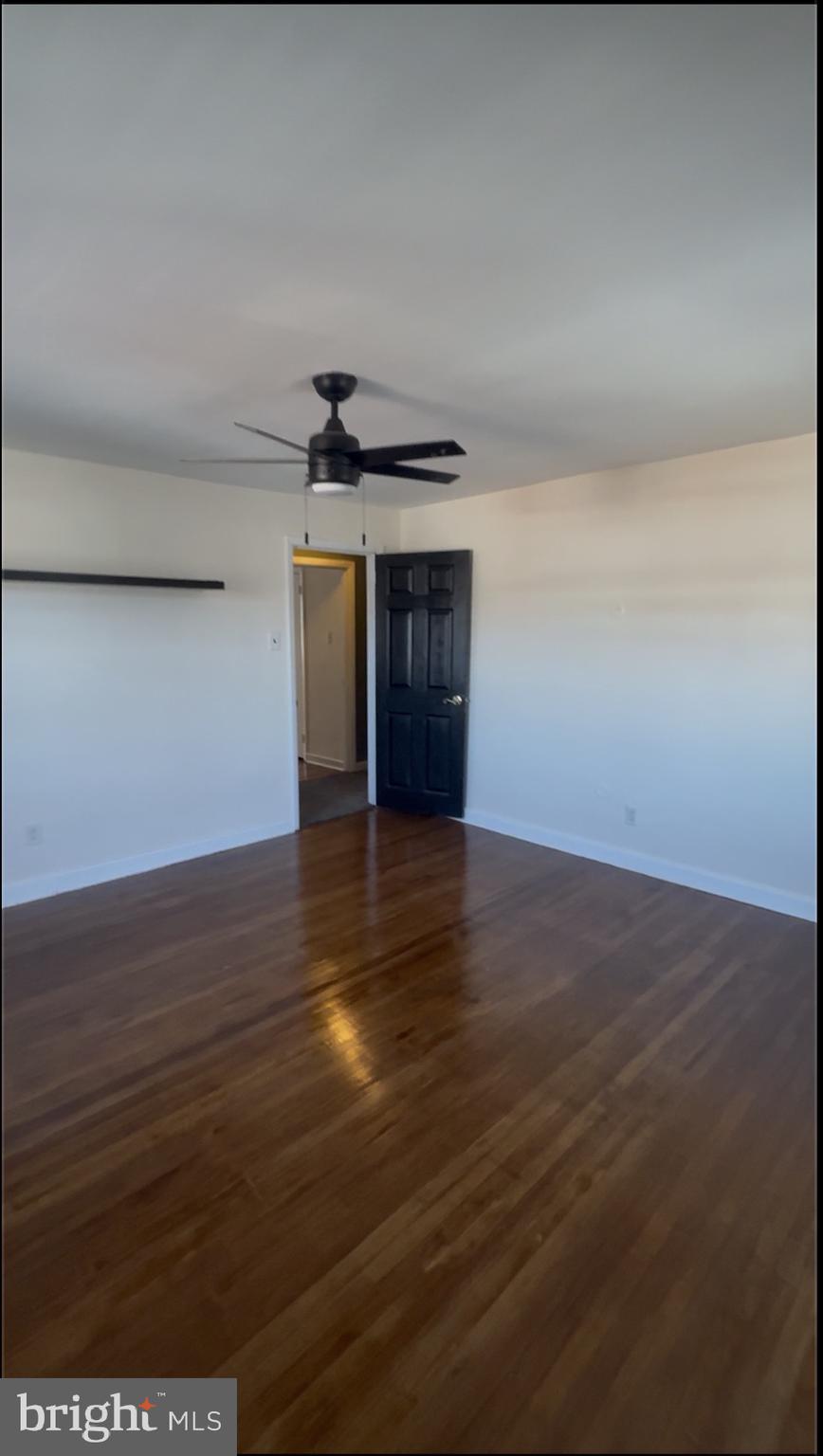 809 Millwood Road Philadelphia, PA 19115 - Photo 19 of 20 a view of a livingroom with wooden floor