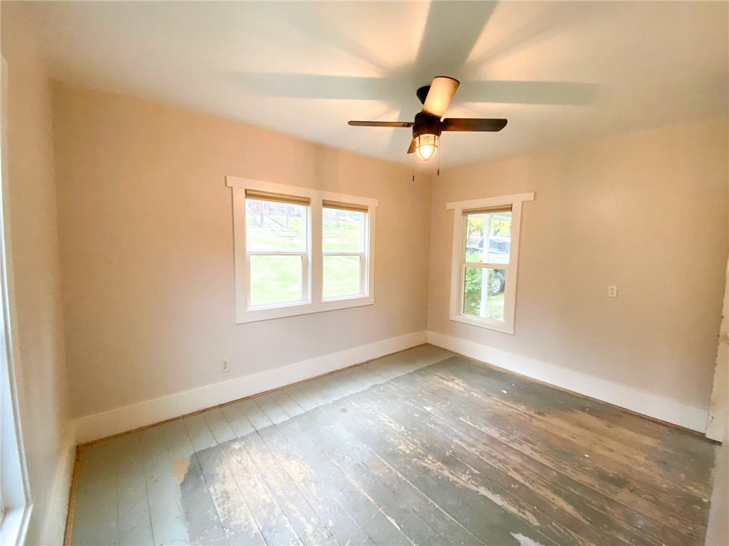 38703 Highway 96 Klamath River, CA 96050 - Photo 15 of 37 an empty room with windows and fan