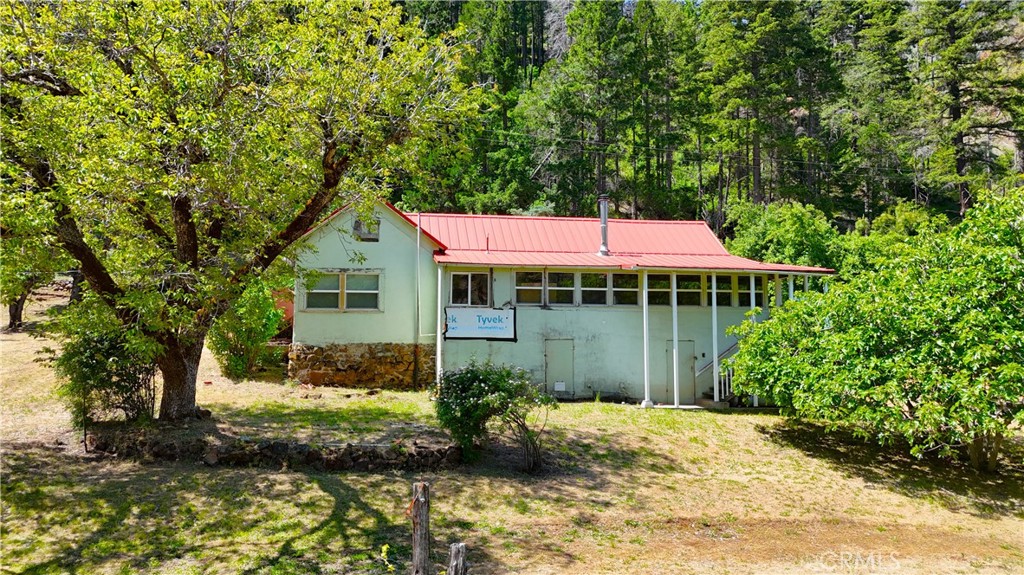 38703 Highway 96 Klamath River, CA 96050 - Photo 20 of 37 a front view of a house with a yard