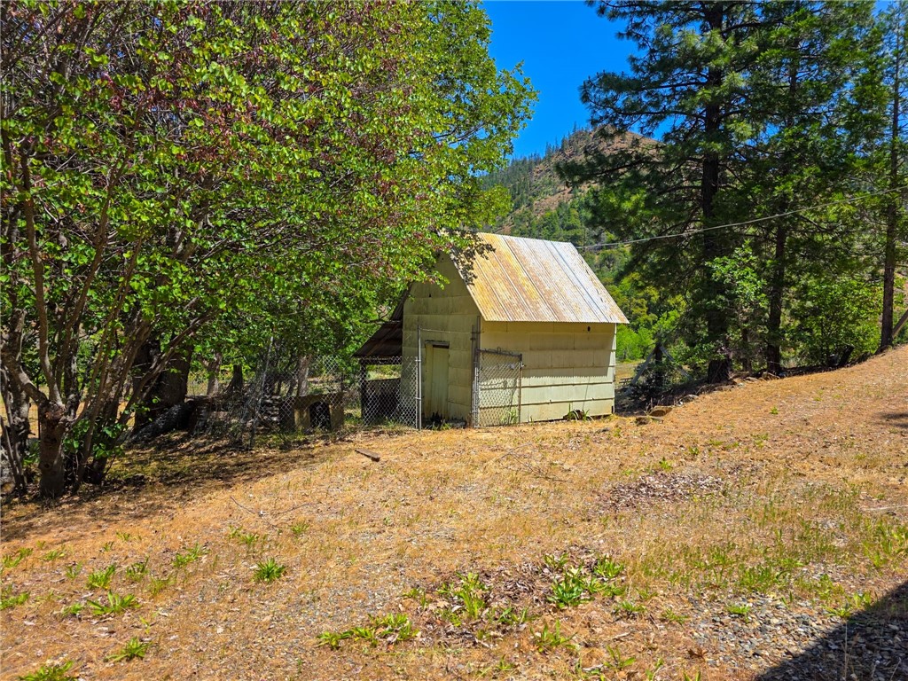 38703 Highway 96 Klamath River, CA 96050 - Photo 25 of 37 a front view of a house with a yard covered with snow