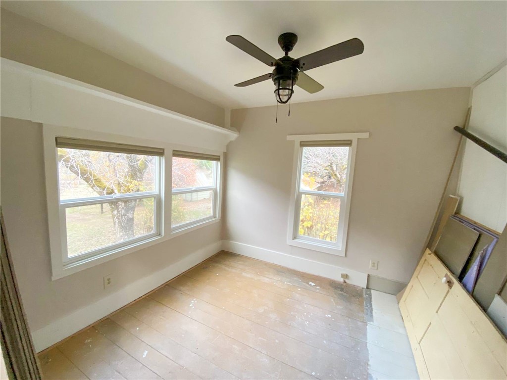 38703 Highway 96 Klamath River, CA 96050 - Photo 10 of 37 a view of a big room with wooden floor and windows