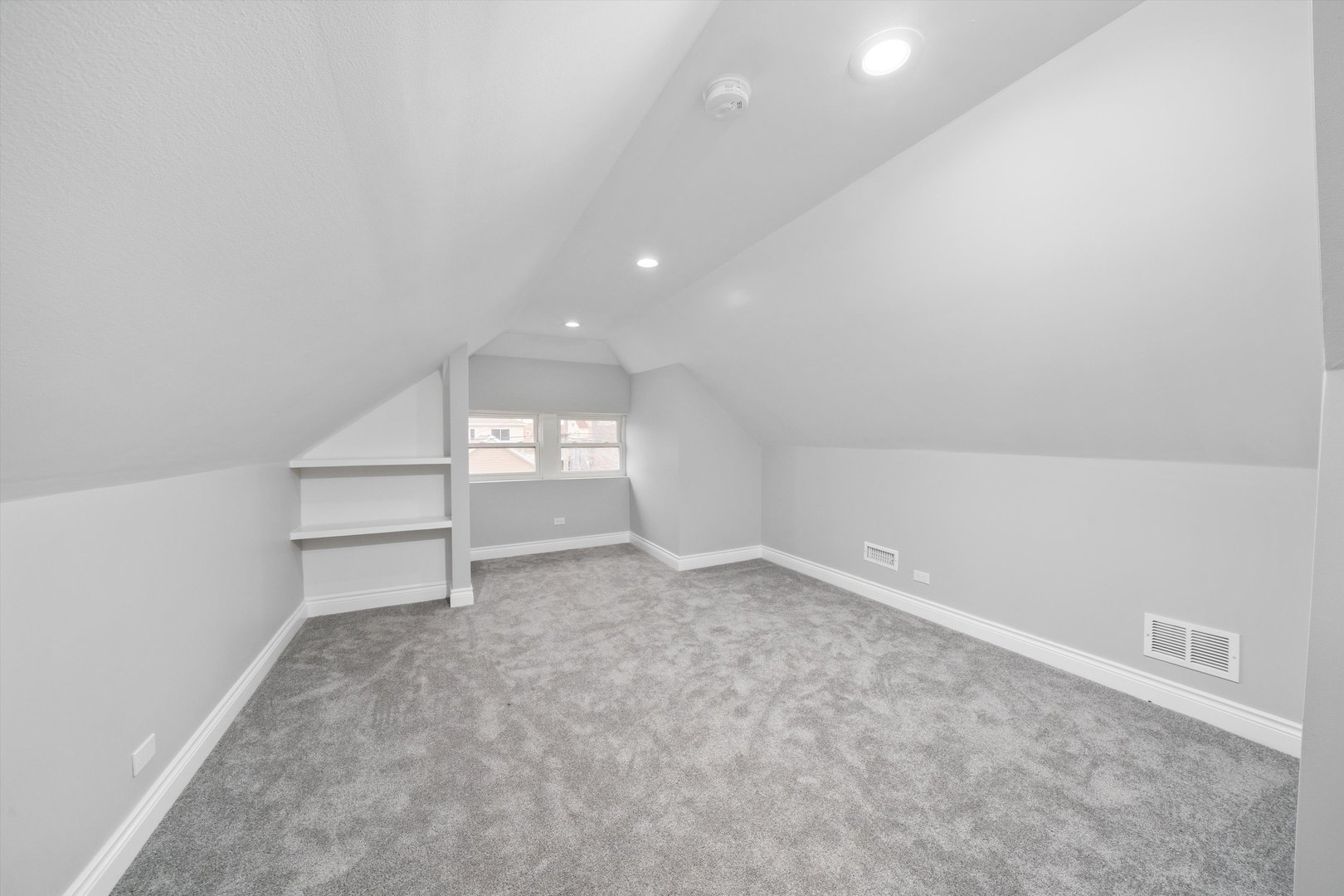 5237 Long Avenue Chicago, IL 60638 - Photo 18 of 41 wooden floor in an empty room with a window