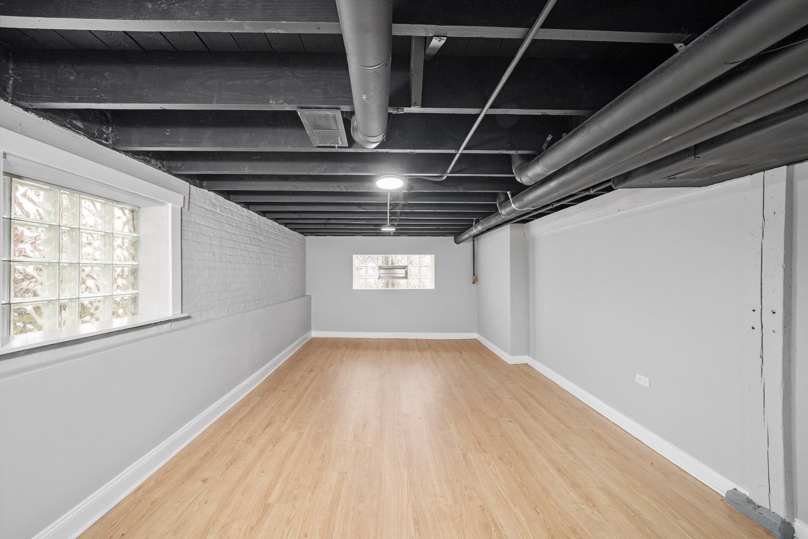 5237 Long Avenue Chicago, IL 60638 - Photo 28 of 41 a view of empty room with wooden floor