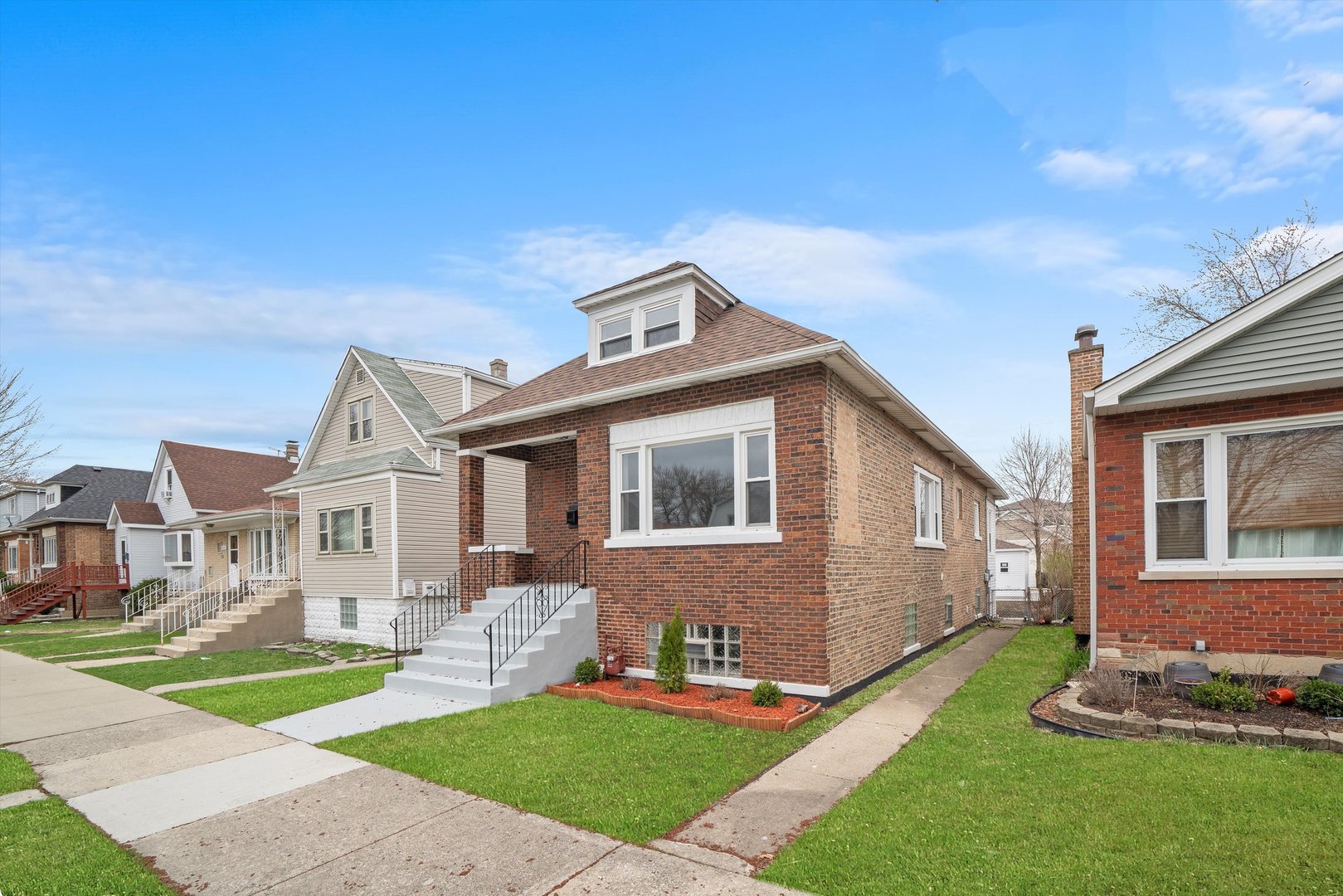 5237 Long Avenue Chicago, IL 60638 - Photo 3 of 41 a front view of a house with a yard