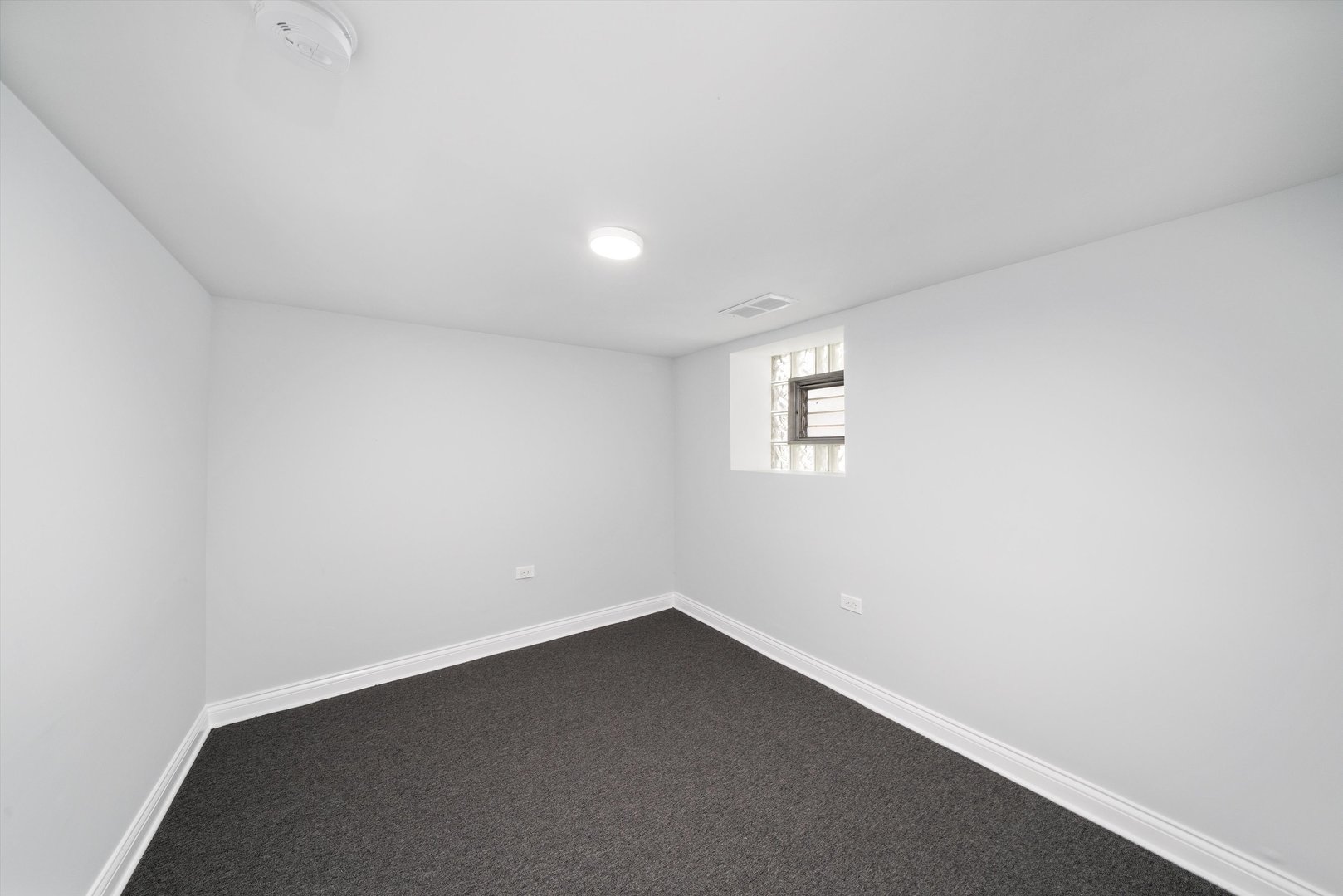 5237 Long Avenue Chicago, IL 60638 - Photo 32 of 41 an empty room with a window