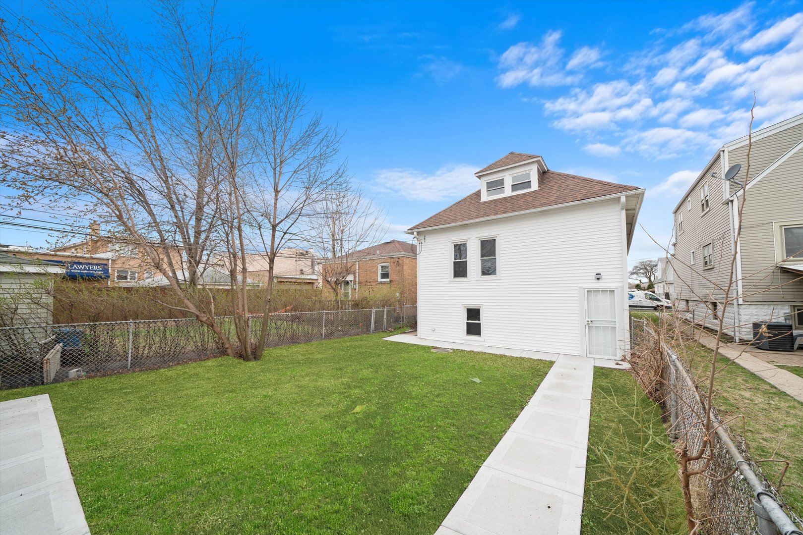 5237 Long Avenue Chicago, IL 60638 - Photo 38 of 41 a front view of a house with a yard