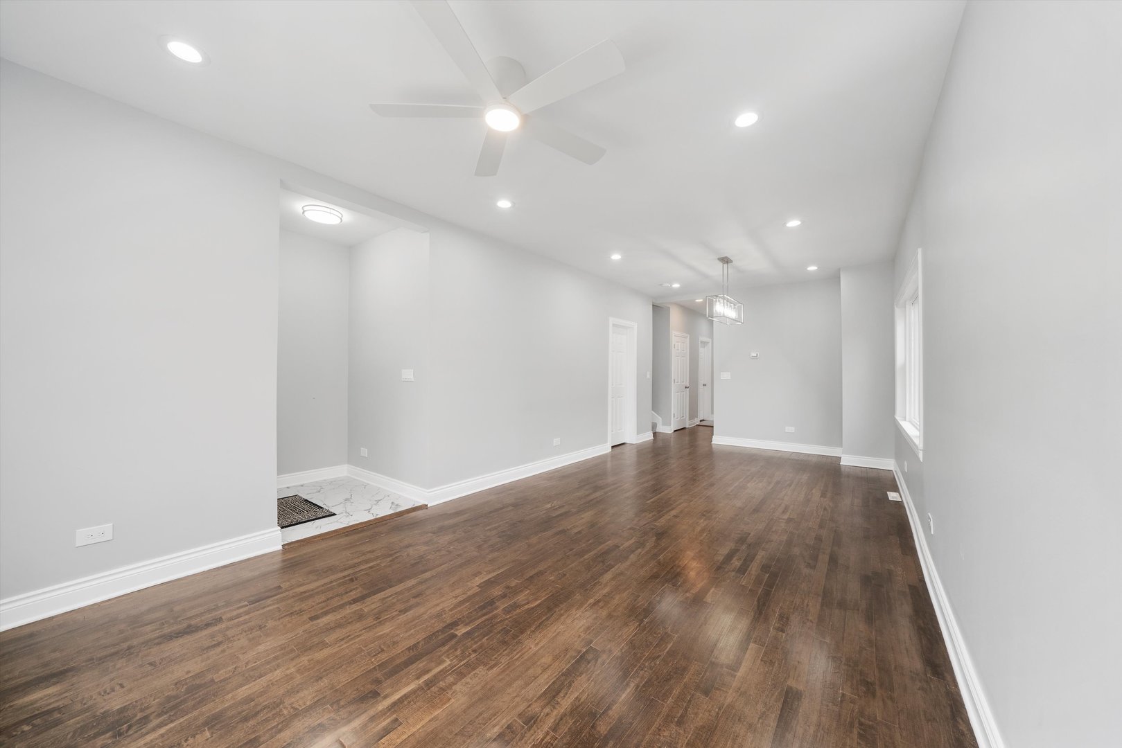 5237 Long Avenue Chicago, IL 60638 - Photo 7 of 41 a view of an empty room with wooden floor