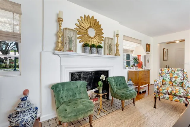 a view of a patio with couches chairs and potted plants