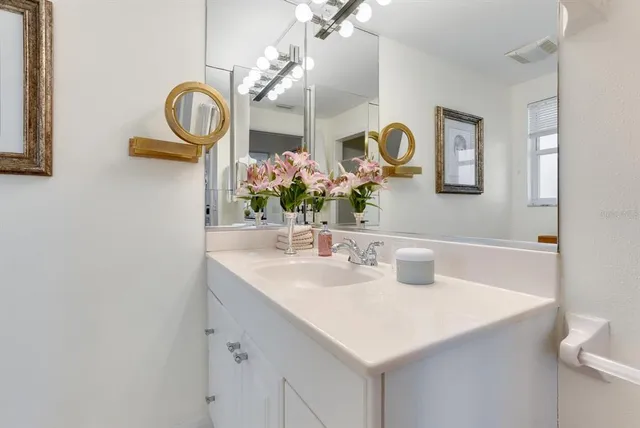 a view of a lake with houses in outdoor space