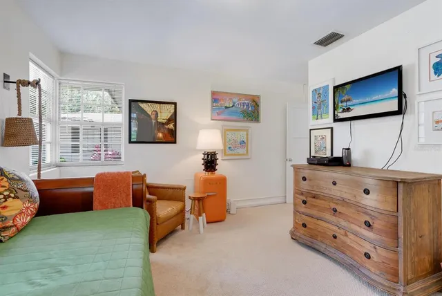 a view of a park with large trees