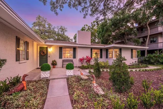 a view of a chairs and tables in patio