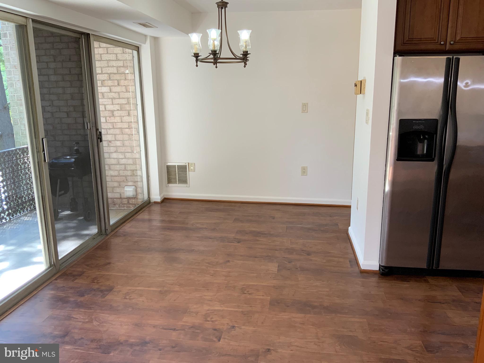 3744 Bel Pre Road, Unit 10 Silver Spring, MD 20906 - Photo 11 of 23 a view of a hallway with closet