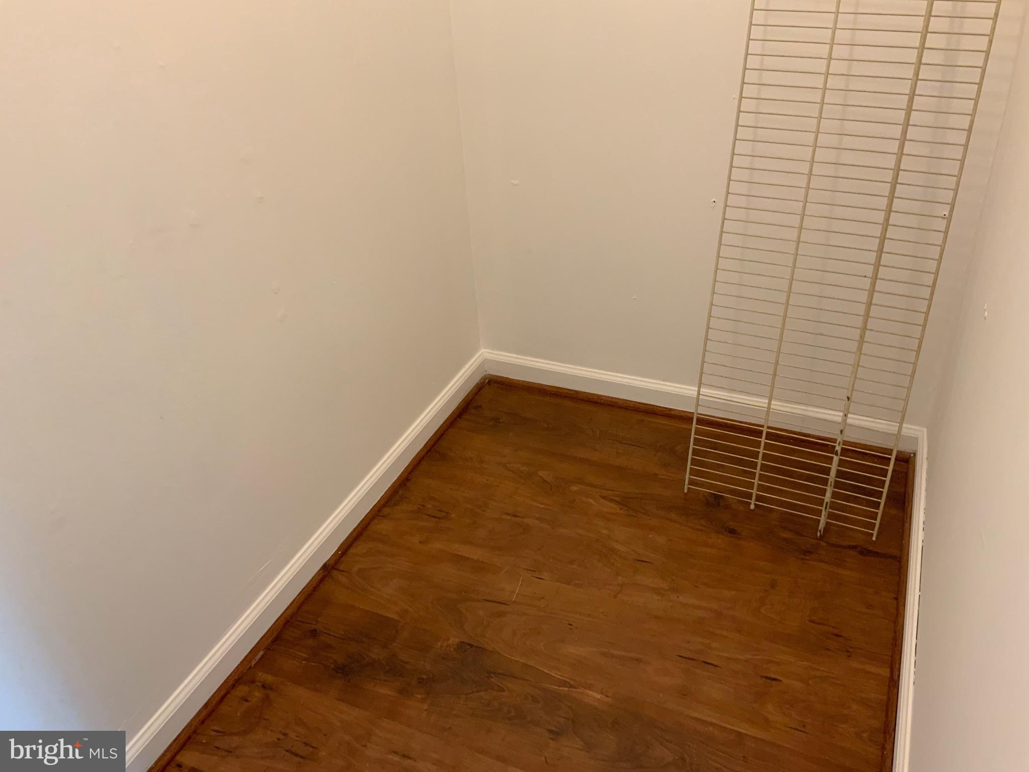 3744 Bel Pre Road, Unit 10 Silver Spring, MD 20906 - Photo 16 of 23 a view of a room with wooden floor