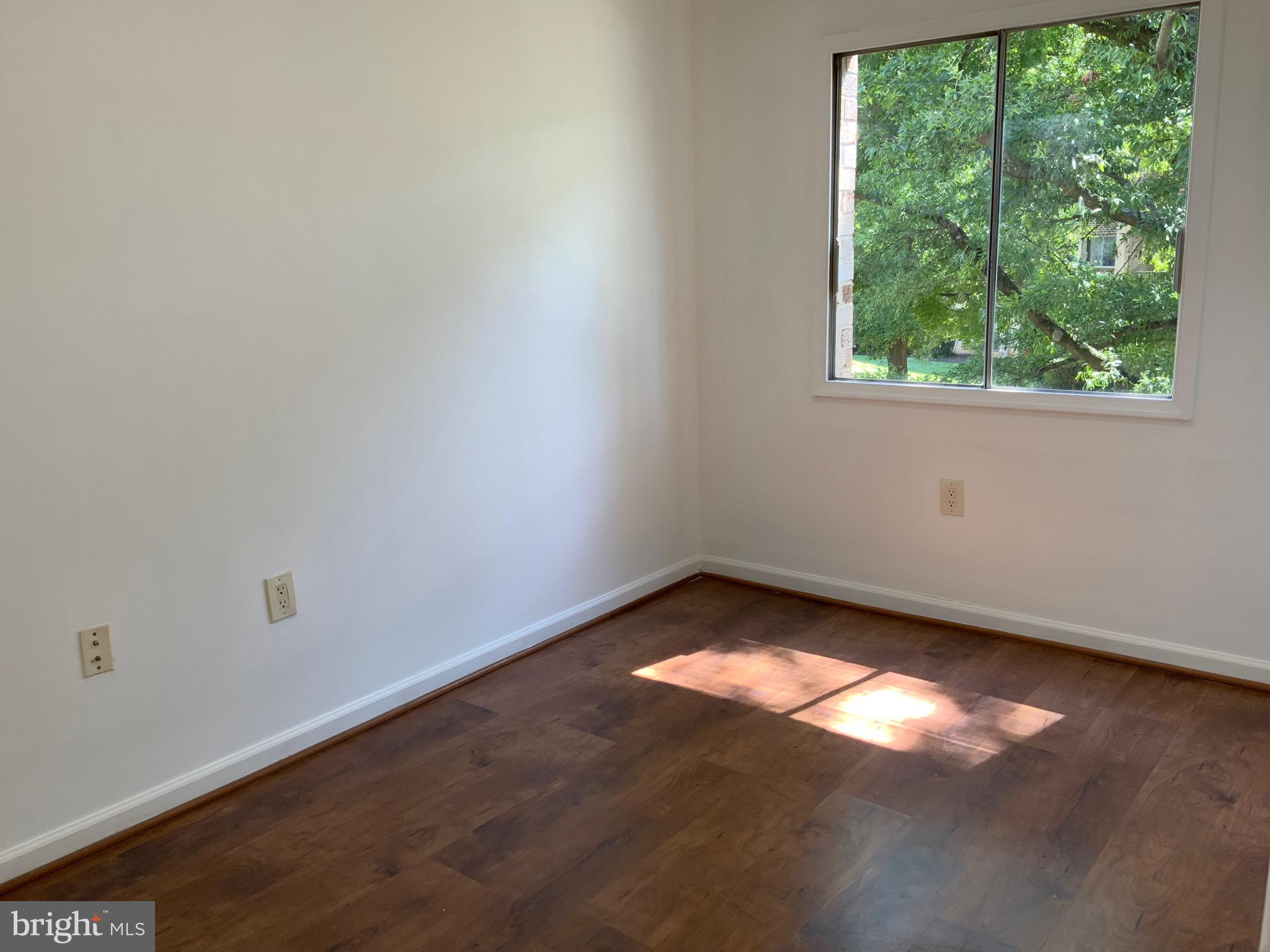 3744 Bel Pre Road, Unit 10 Silver Spring, MD 20906 - Photo 21 of 23 an empty room with a window